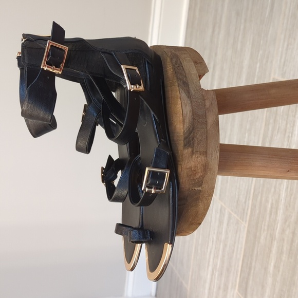 BCBG Generation Black Leather and Gold Gladiator Sandals - Picture 3 of 7